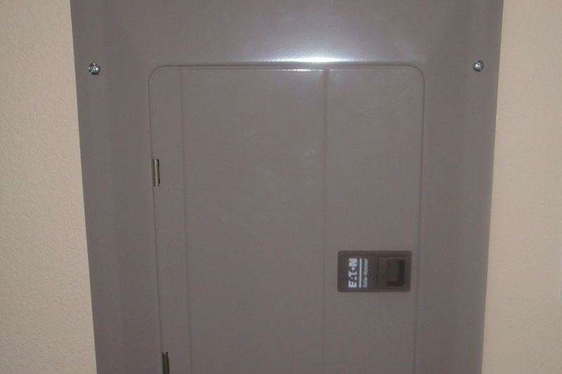 Closed residential circuit breaker panel cover